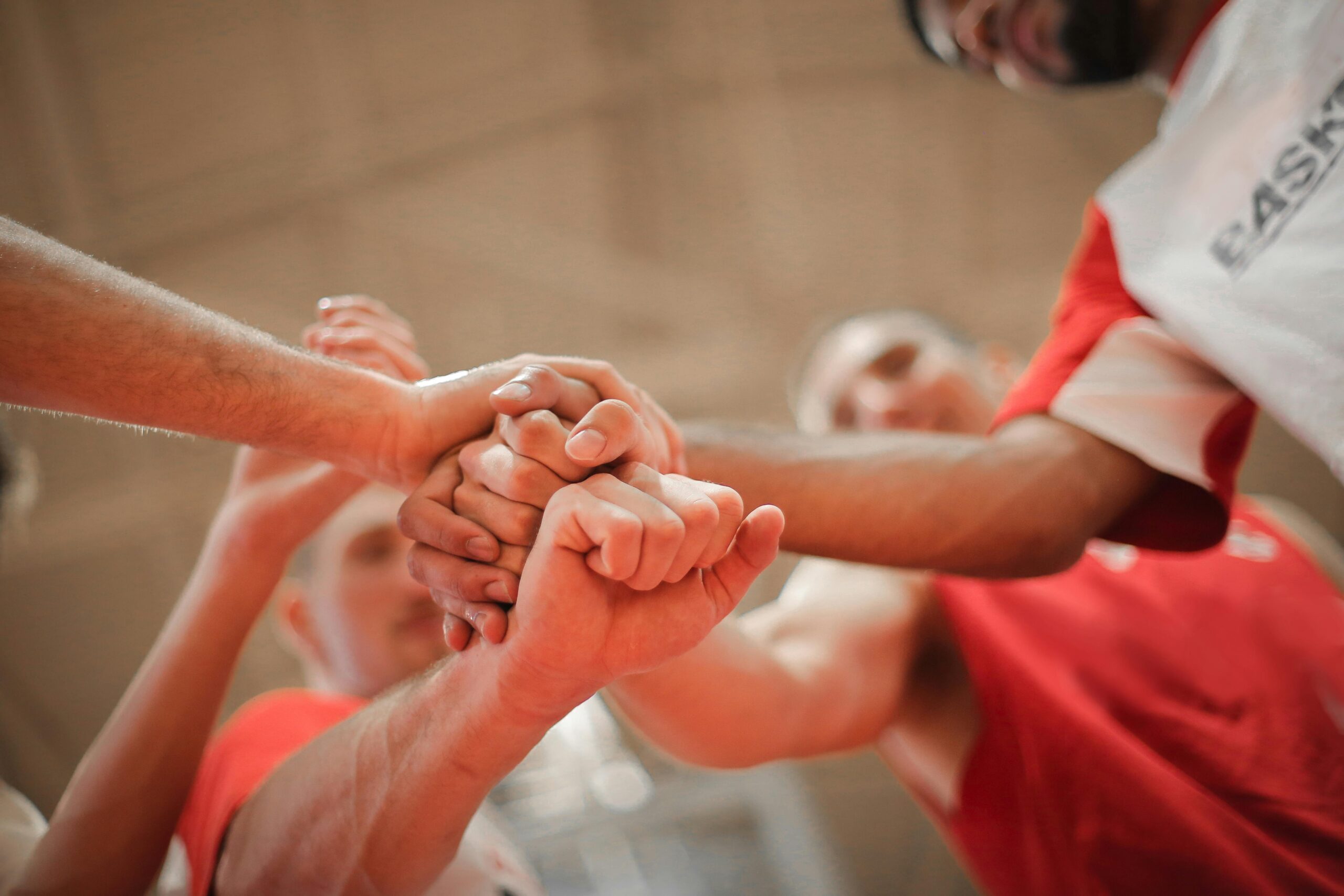 Basketballmannschaft, Die Hände Zusammen Stapelt